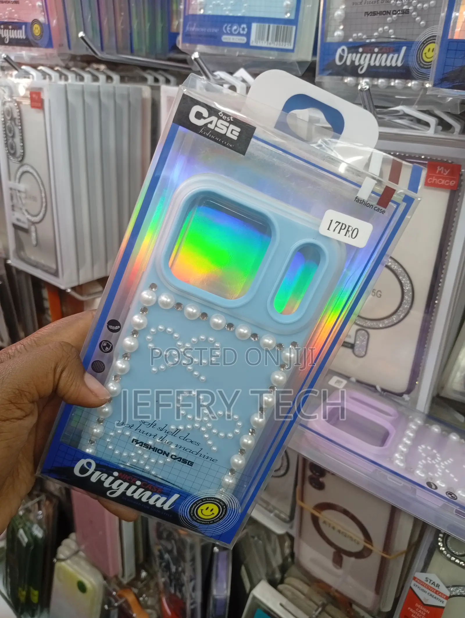Blue 3d Pearl Bow Rhinestone Case Designed for the iPhone 17 Pro.