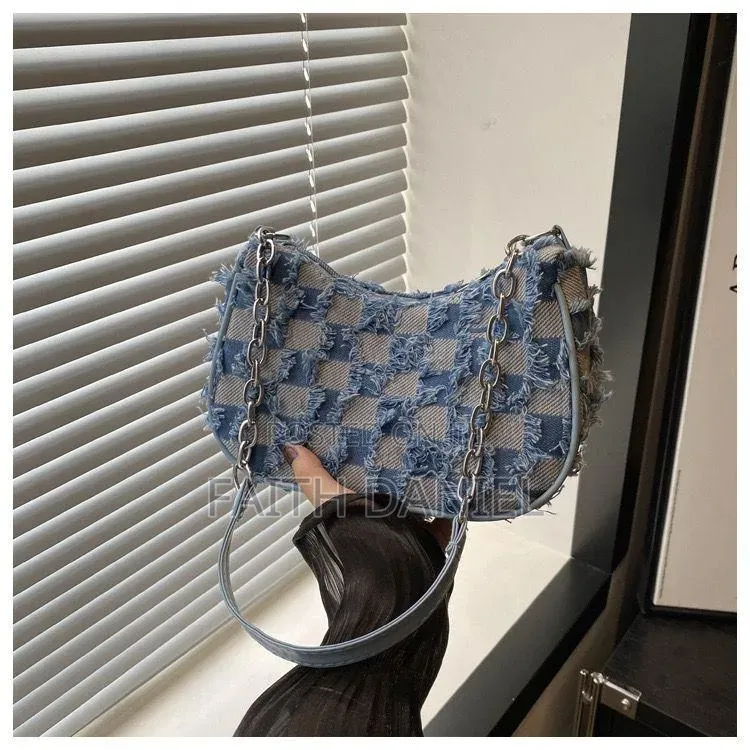 Grunge-Chic Frayed Denim Micro Hobo