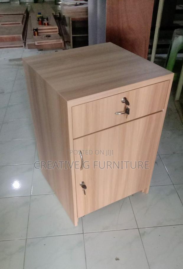Light Wood Mobile Cabinet With Drawer Door - main view