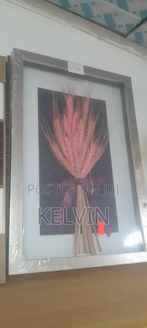 Pink Dried Wheat Stems Arranged in a Framed Shadow Box.
