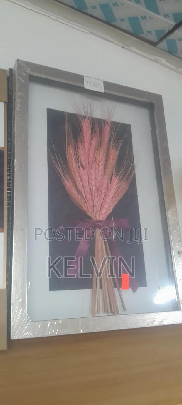 Pink Dried Wheat Stems Arranged in a Framed Shadow Box.