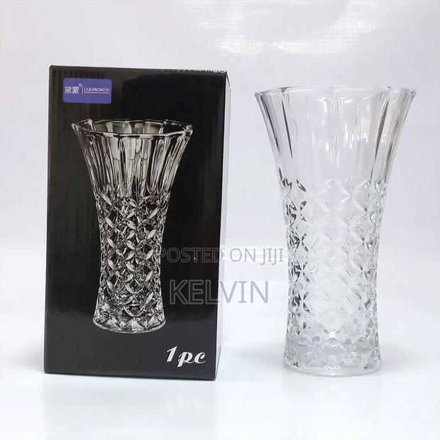 This Is a Generic Diamond-Cut Clear Glass Flower Vase.