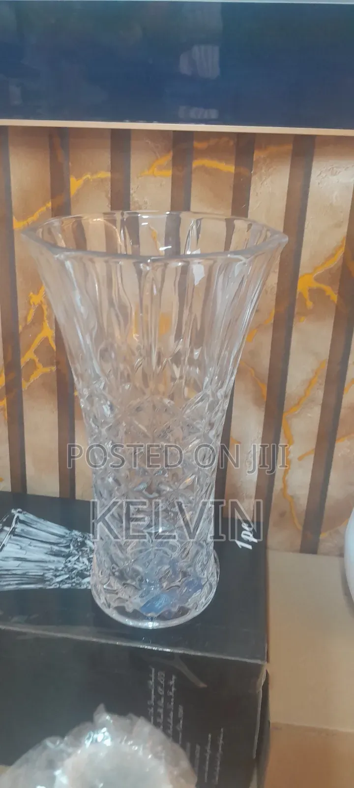 This Is a Generic Diamond-Cut Clear Glass Flower Vase.