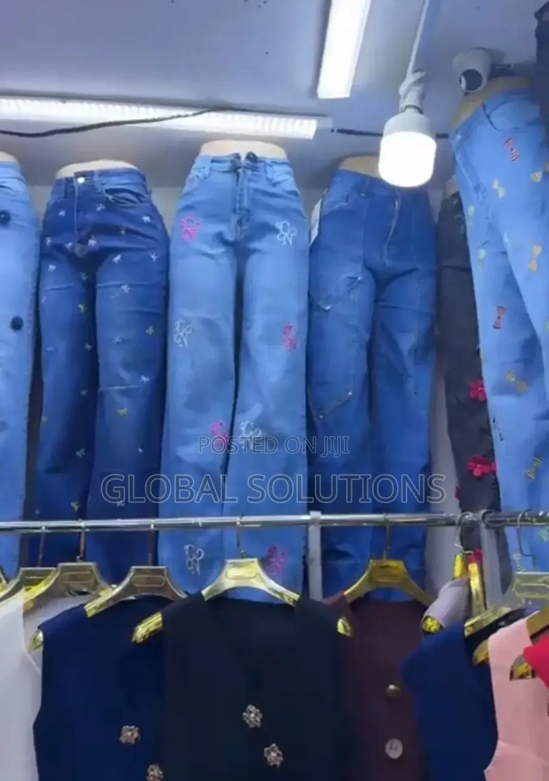 Stylish Women's High-Waisted Denim Jeans With Embroidered "Cn" Logos