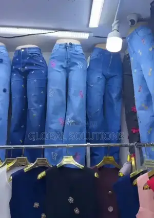 Stylish Women's High-Waisted Denim Jeans With Embroidered "Cn" Logos