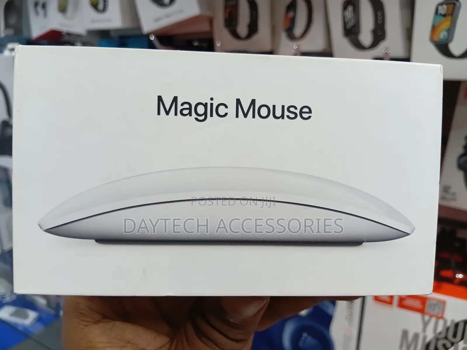 This Is an Apple Magic Mouse in White With a Multi-Touch Surface.