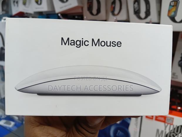This Is an Apple Magic Mouse in White With a Multi-Touch Surface. - thumbnail 3