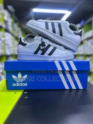 White Adidas Superstar Sneakers
