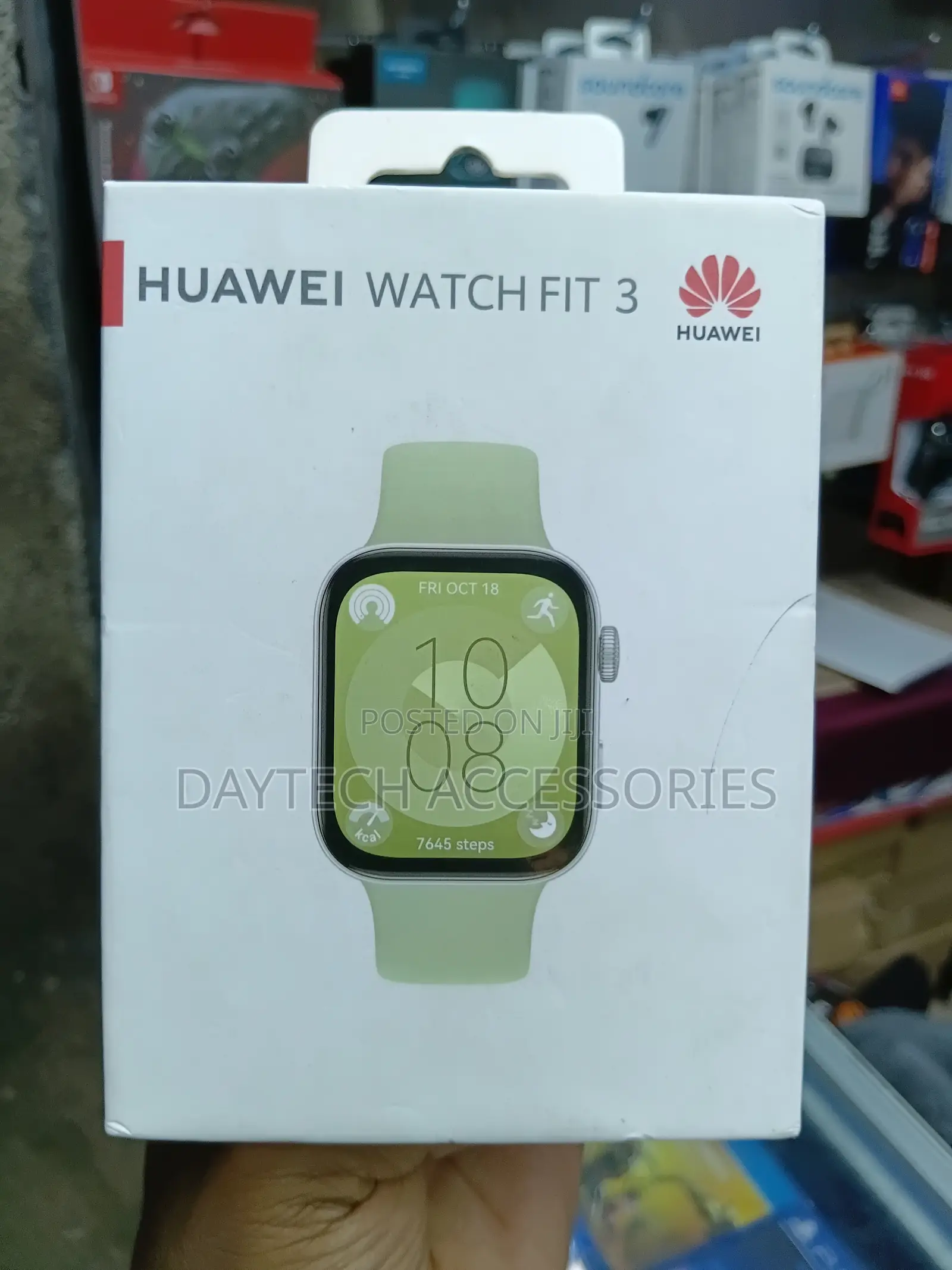 This Is a Huawei Watch Fit 3 With a Green Strap.