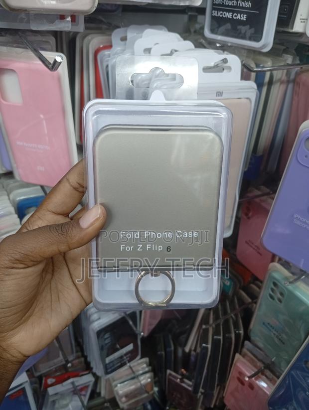 Samsung Galaxy Z Flip 6 With a Metal Ring Holder and Hinge Protection