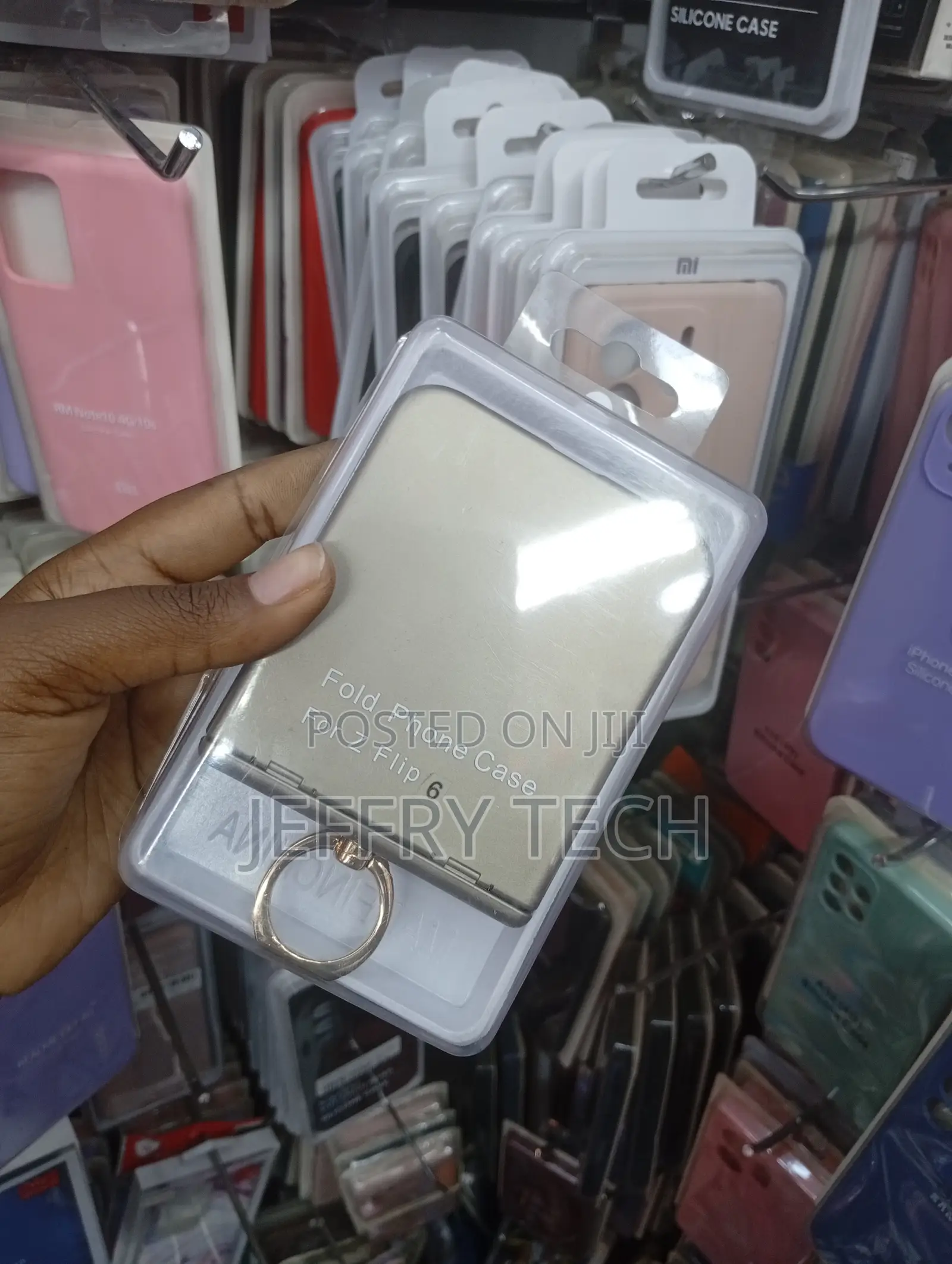 Samsung Galaxy Z Flip 6 With a Metal Ring Holder and Hinge Protection