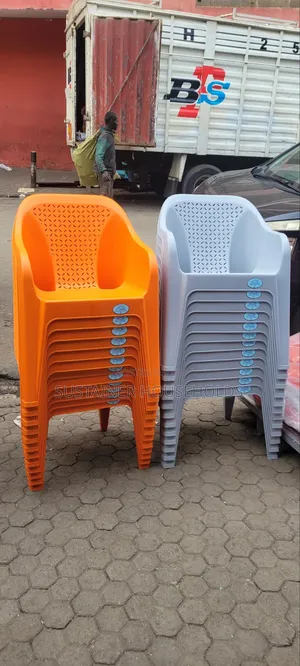 Grey and Orange Skyplast Plastic Chairs