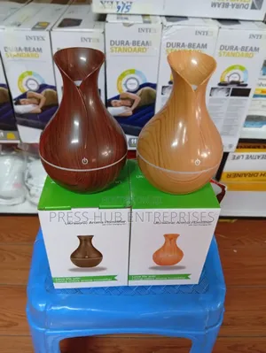 Ultrasonic Aroma Humidifier With Colorful Led Lights.