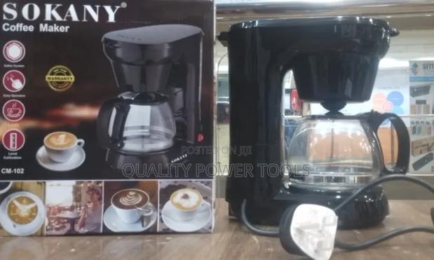 Black Sokany Cm-102 Drip Coffee Maker With a Glass Carafe.