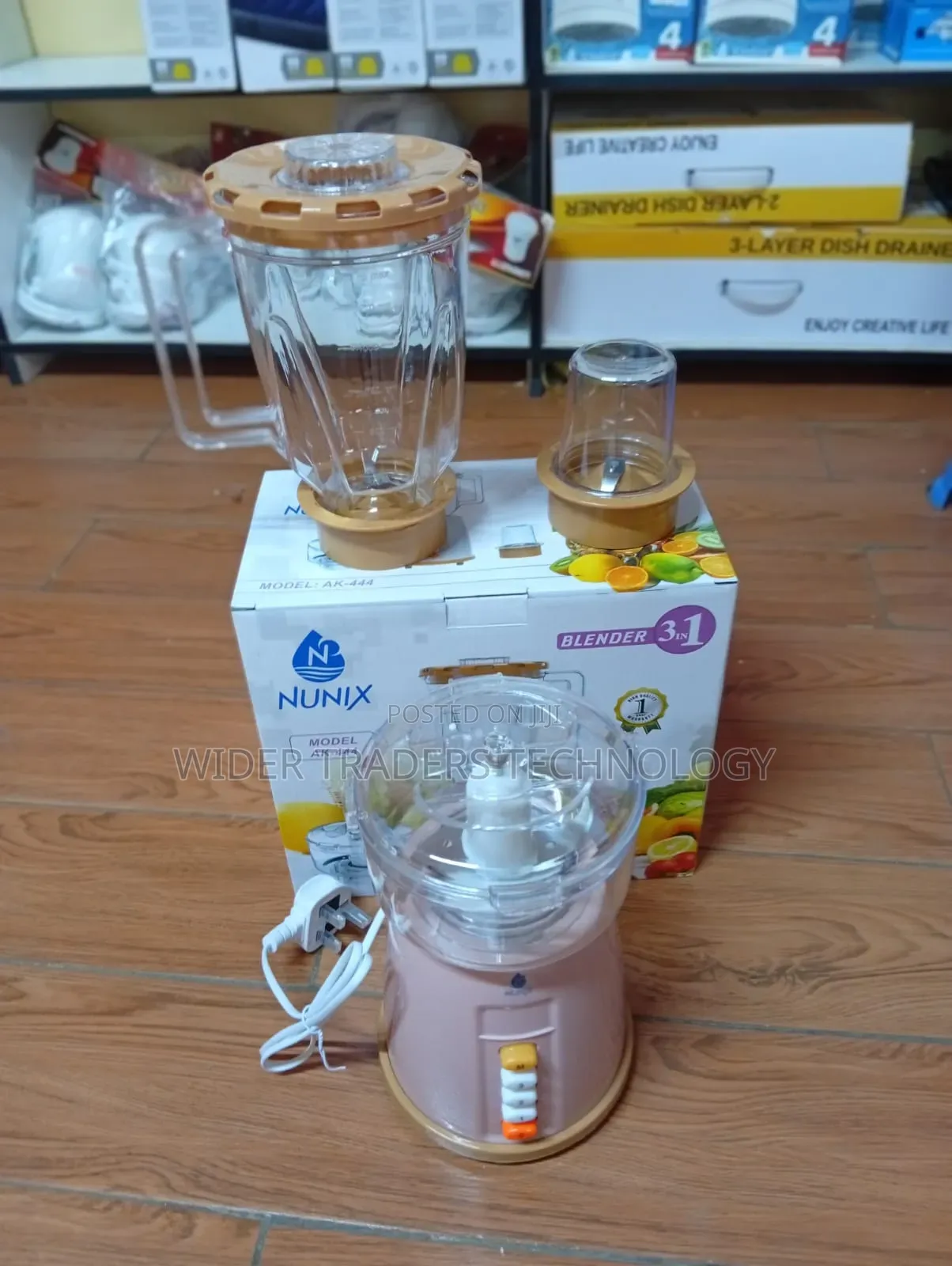 Nunix Ak-444 3-in-1 Blender With a Beige Base and Plastic Jars