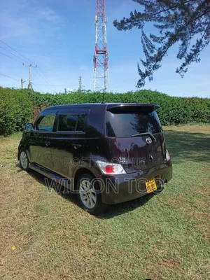 Toyota bB 2012 Red