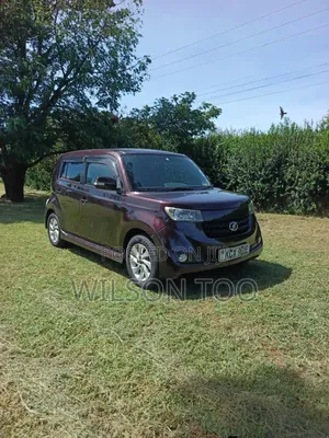 Toyota bB 2012 Red