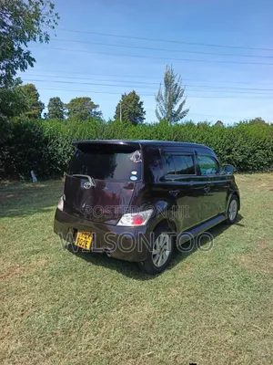 Toyota bB 2012 Red