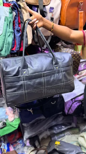 Sleek Spacious Duffel Leather Finish Travel Bags
