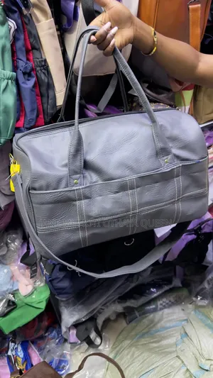 Sleek Spacious Duffel Leather Finish Travel Bags