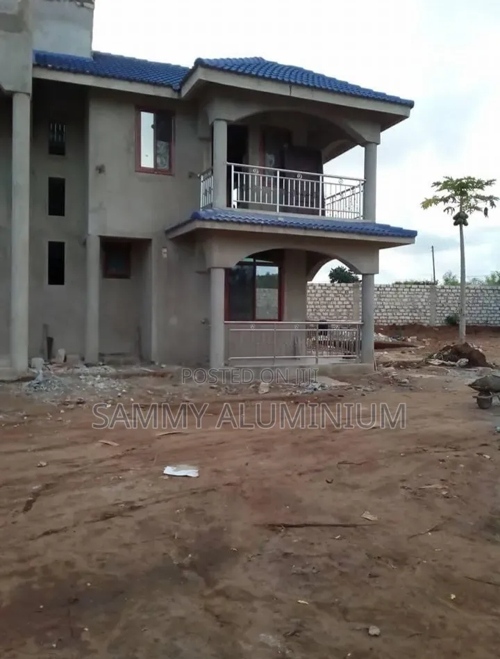 Tiwi Project, Wood Finish Aluminium Sliding Windows