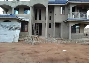 Tiwi Project, Wood Finish Aluminium Sliding Windows