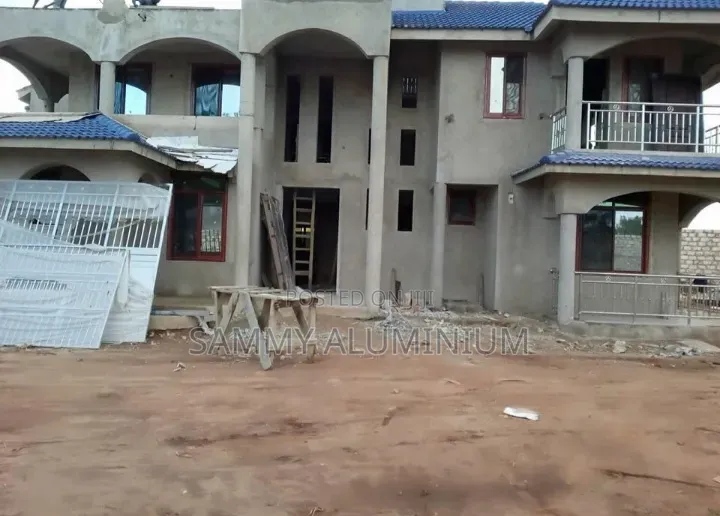 Tiwi Project, Wood Finish Aluminium Sliding Windows