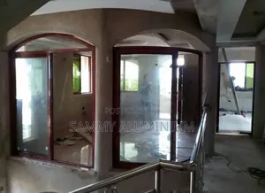 Tiwi Project, Wood Finish Aluminium Sliding Windows