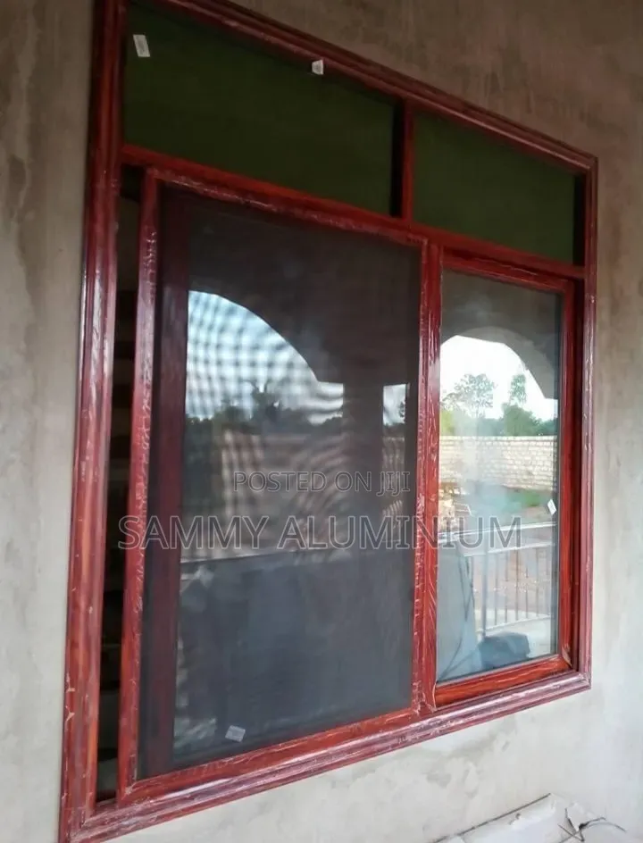 Tiwi Project, Wood Finish Aluminium Sliding Windows
