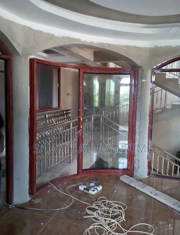 Tiwi Project, Wood Finish Aluminium Sliding Windows