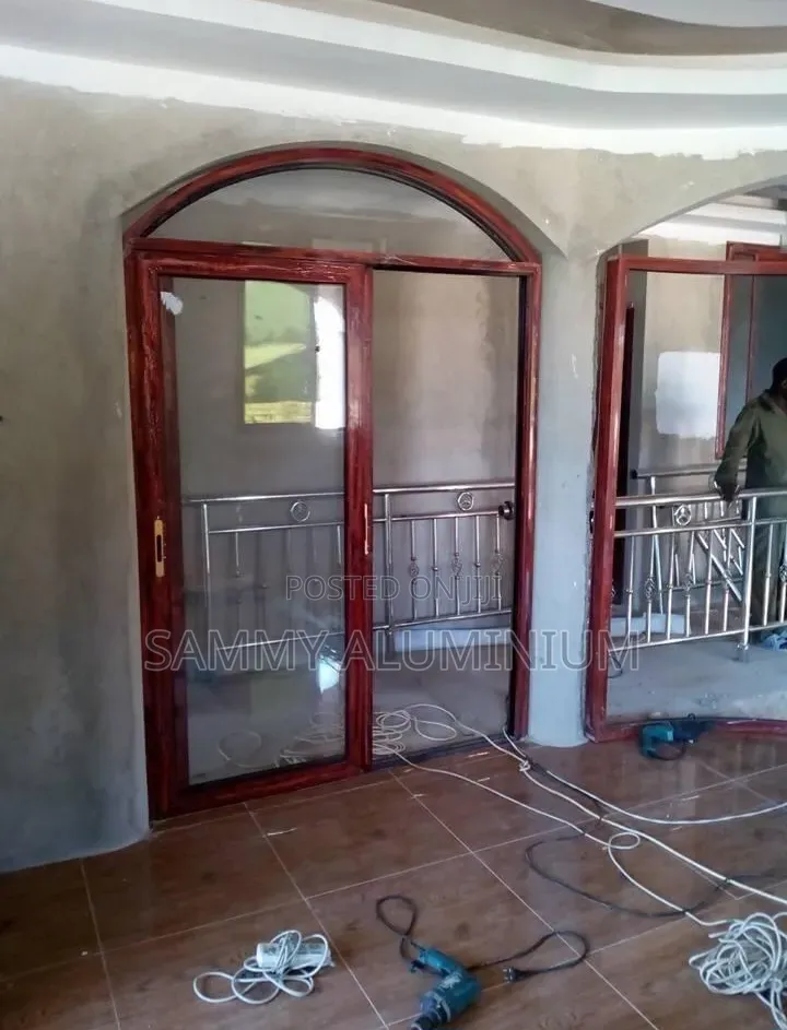 Tiwi Project, Wood Finish Aluminium Sliding Windows