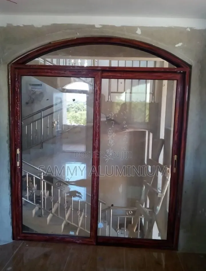 Tiwi Project, Wood Finish Aluminium Sliding Windows