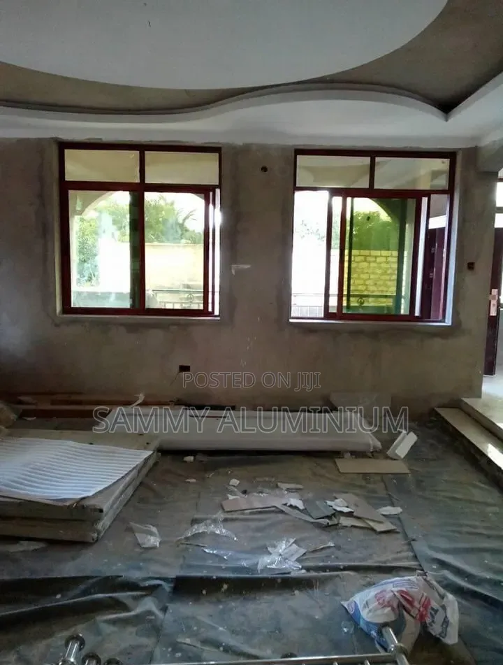 Tiwi Project, Wood Finish Aluminium Sliding Windows
