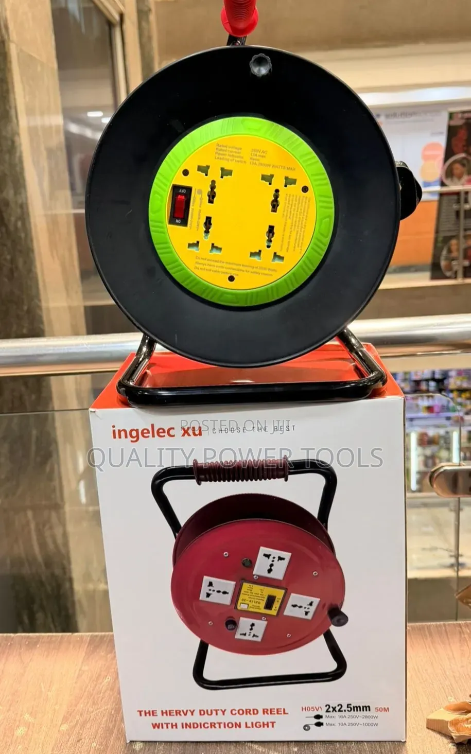 Red Ingelec Xu Heavy Duty Cord Reel With A 50-meter Cable.