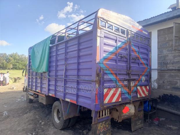 Isuzu NQR 2019 White - thumbnail 2