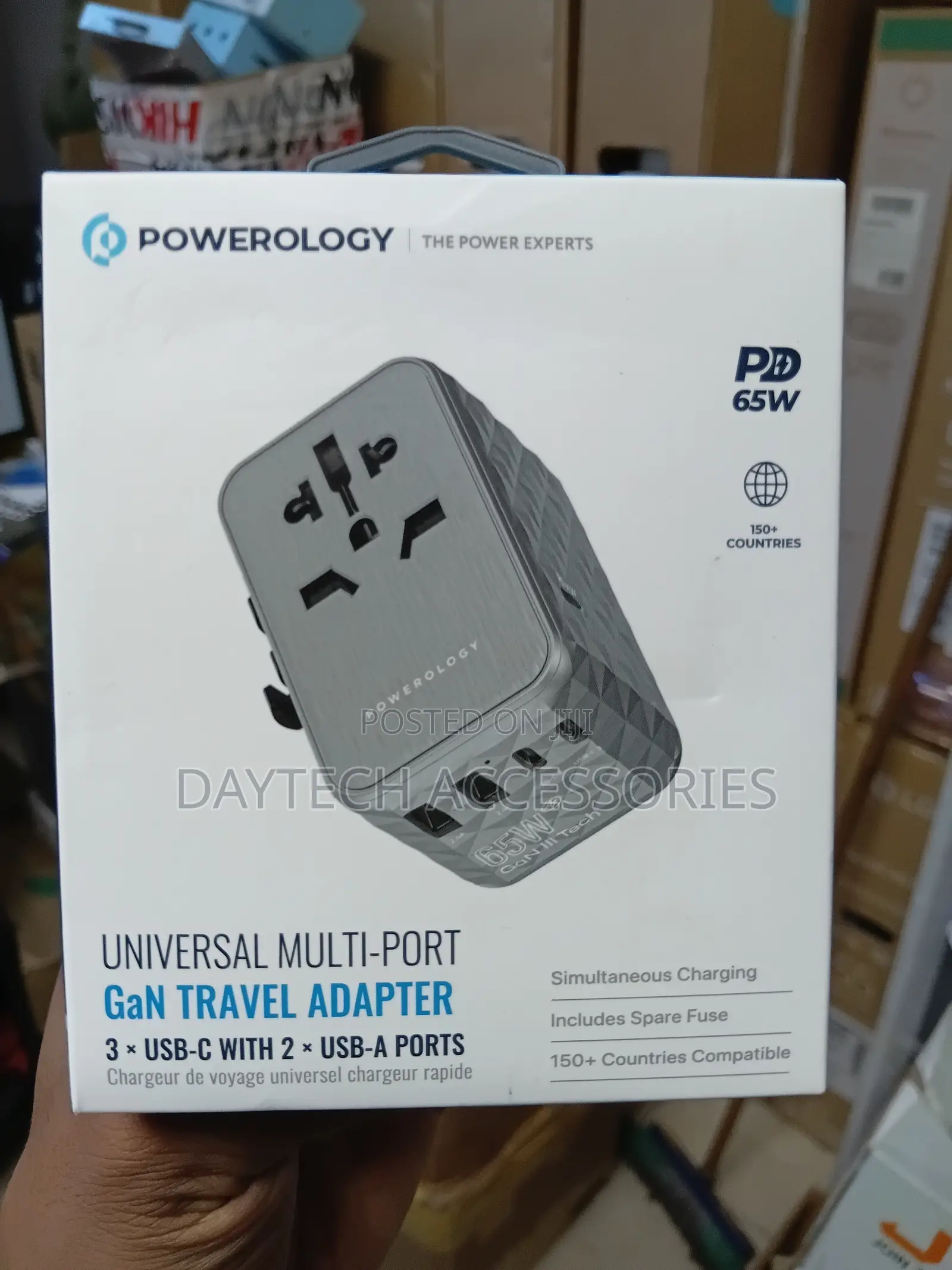 This Is a Powerology 65w Gan Universal Multi-Port Travel Adapter Grey.