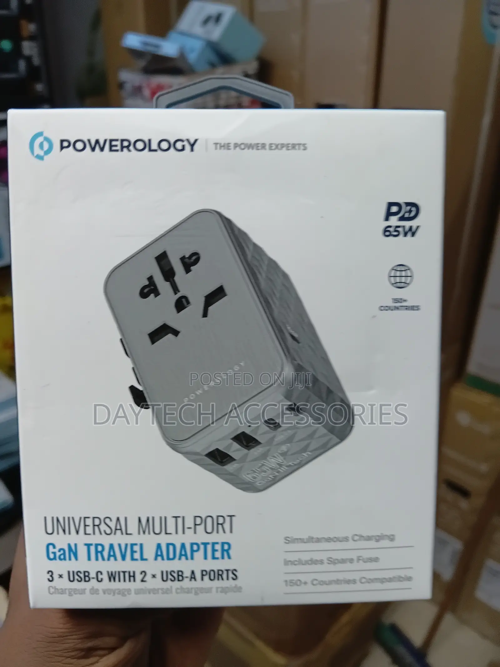 This Is a Powerology 65w Gan Universal Multi-Port Travel Adapter Grey.