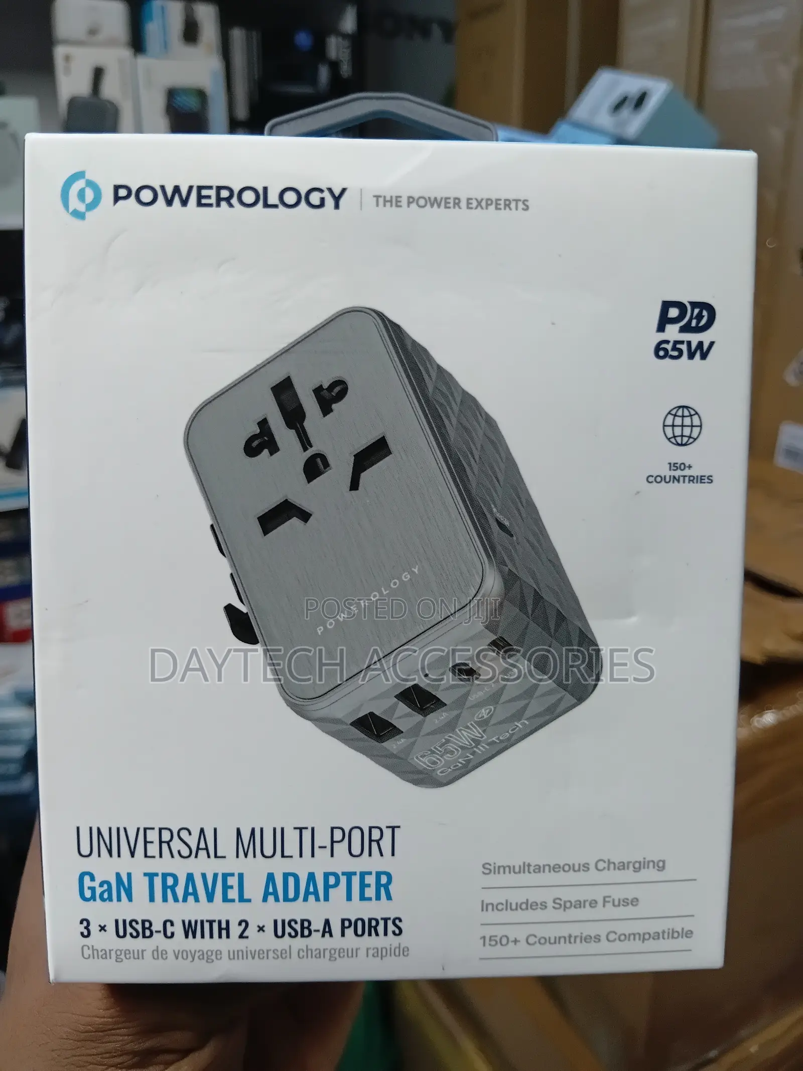 This Is a Powerology 65w Gan Universal Multi-Port Travel Adapter Grey.