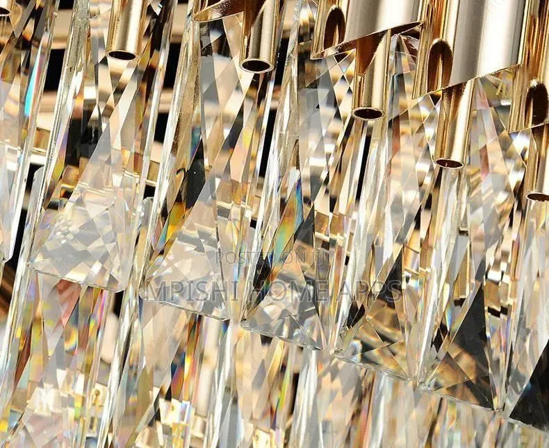 Modern Oval-Shaped Crystal Chandelier in a Gold Aluminum Finish