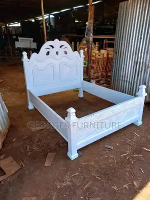 White Wooden Bed