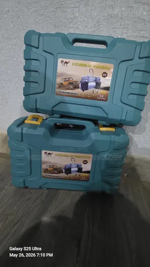 Portable Double-Cylinder Car Air Compressor With a Tire Repair Tool
