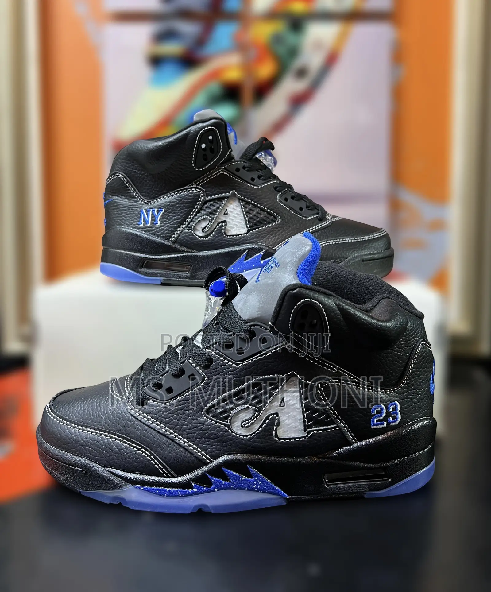 The Nike Air Jordan 5 Retro Awake Ny Black Sneakers.
