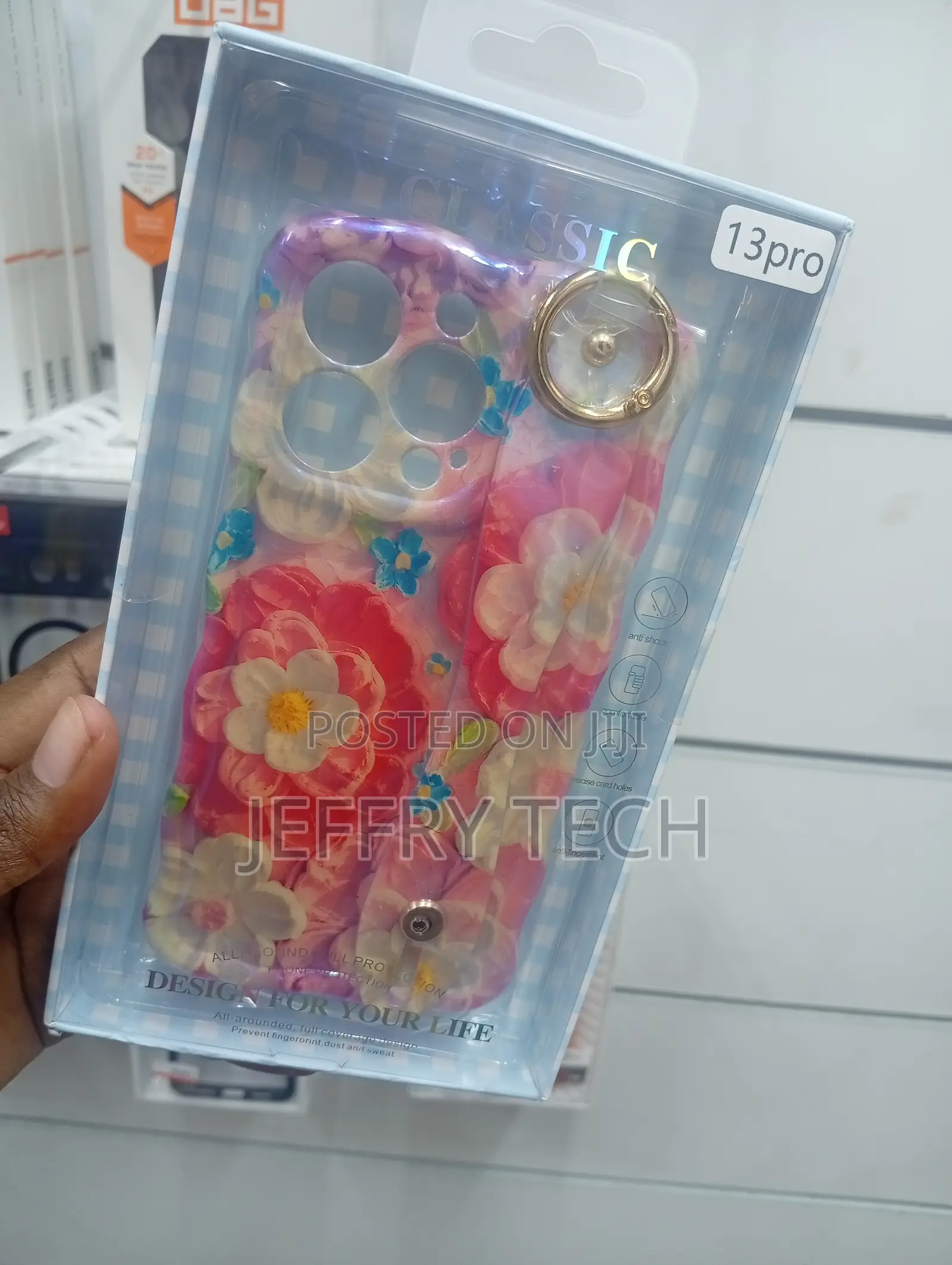iPhone 13 Pro Case Featuring a Wavy Frame and a Wristband Holder.