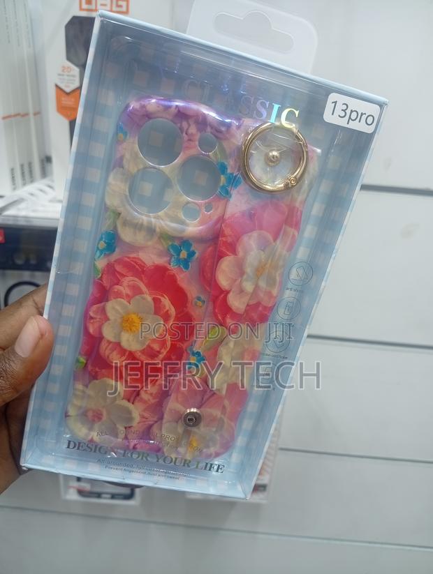 iPhone 13 Pro Case Featuring a Wavy Frame and a Wristband Holder. - thumbnail 2