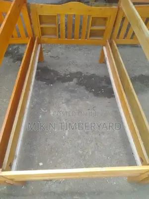 3.5 by 6 Wooden Bed