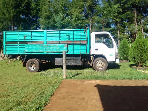 Isuzu NPR Openbody With a Tipping Jark Kcu - thumbnail 3