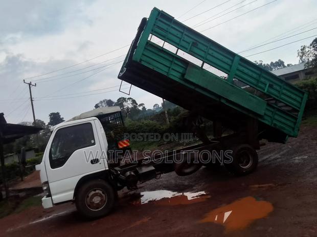 Isuzu NPR Openbody With a Tipping Jark Kcu - thumbnail 5