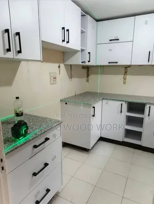 Repairs for Kitchen Cabinets and Fitting Work