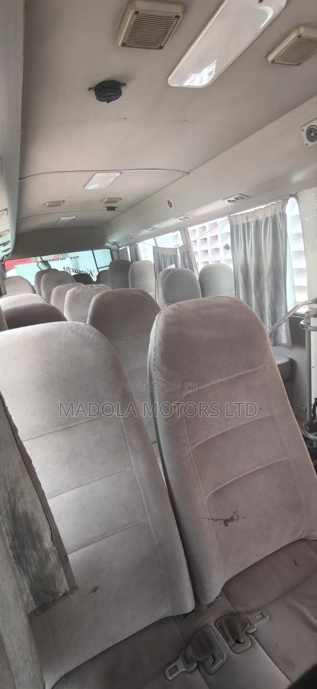 Toyota Coaster 2015 White - thumbnail 4