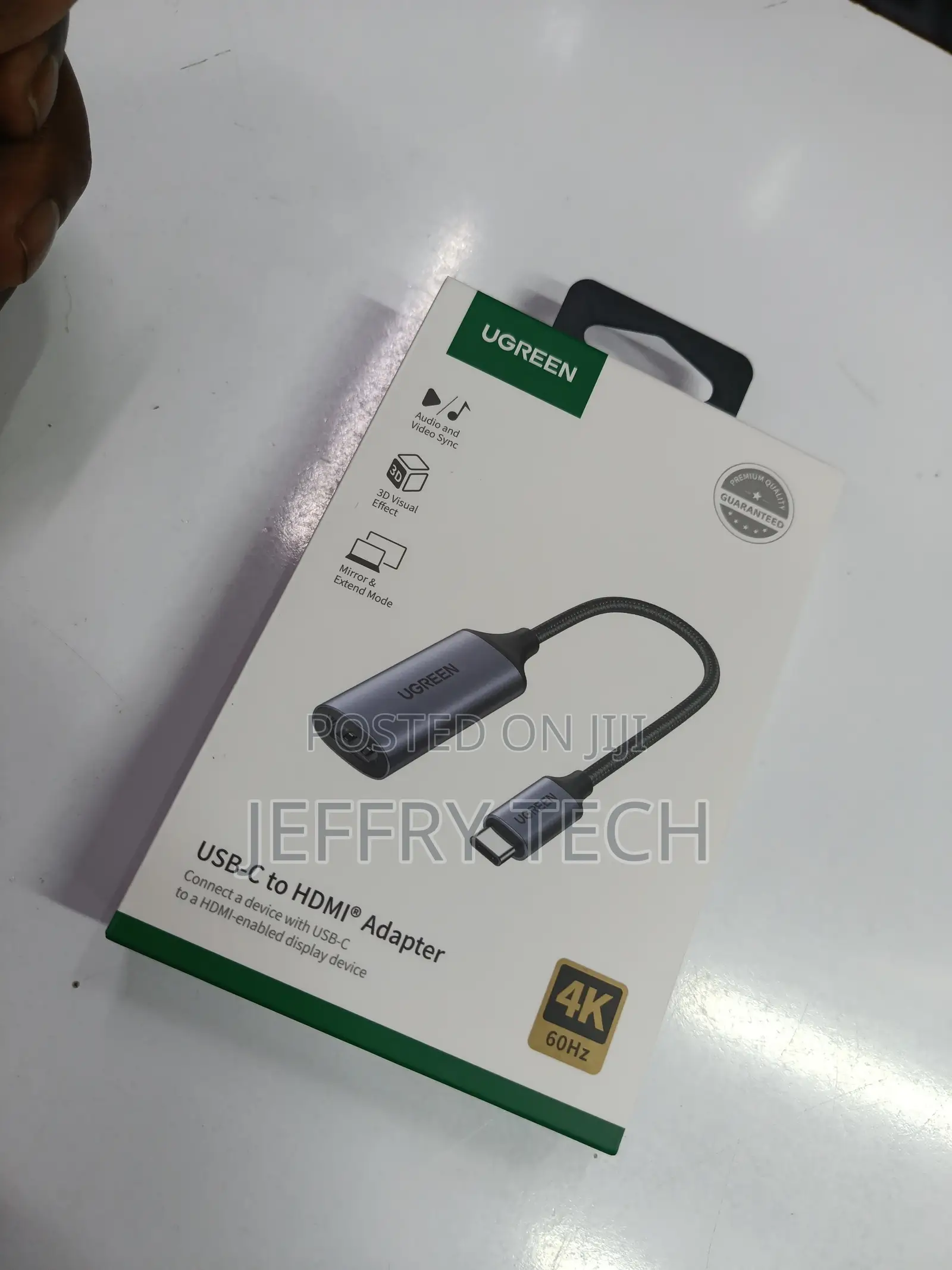 Ugreen Cm297 Usb-C to Hdmi Adapter in a Gray Aluminum Alloy Finish.